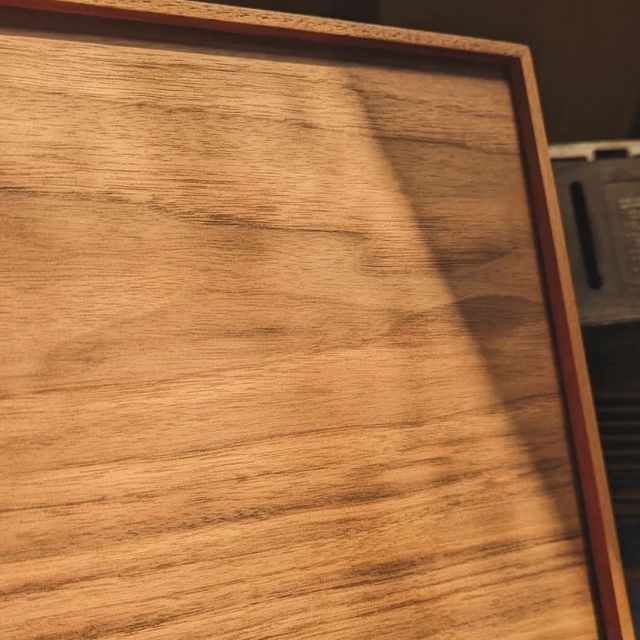 Close-up of the grain on a walnut bathroom vanity